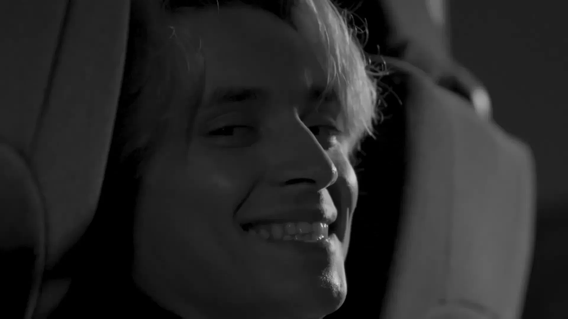 Narrative short film cinematography with dramatic black and white lighting and staging
